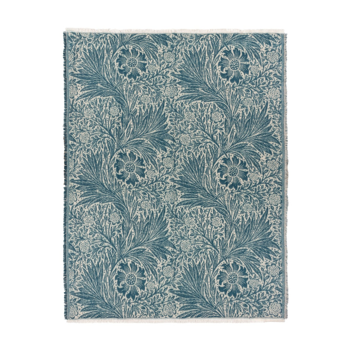 Marigold Jacquard Cotton Throw in indigo, a woven blue and cream botanical floral pattern with fringed edges, shown on a plain white background.