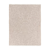 Marigold Jacquard Cotton Throw in stone, featuring a tonal woven leaf, acorn and bloom pattern with fringed edges, shown on a plain white background.