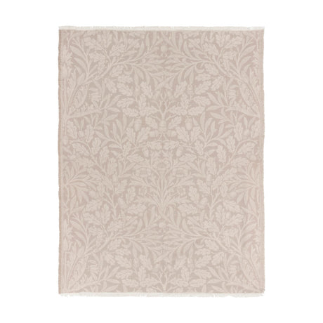 Marigold Jacquard Cotton Throw in stone, featuring a tonal woven leaf, acorn and bloom pattern with fringed edges, shown on a plain white background.