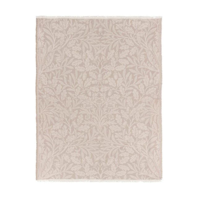 Marigold Jacquard Cotton Throw in stone, featuring a tonal woven leaf, acorn and bloom pattern with fringed edges, shown on a plain white background.
