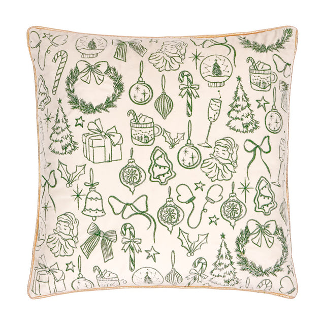 Square ecru velvet cushion with dark green embroidered Christmas motifs—baubles, wreaths, candy canes, trees and Santas—finished with gold piped trim, shown on a white background.