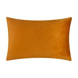 Rectangular velvet cushion in solid burnt-orange, shown plain-side on a white background, from the Metro Diamond Jacquard set.