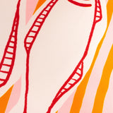 Close-up of the Mediterranean Sardines Reversible Polyester Cushion showing red line-drawn fish detail on a pink-and-orange striped fabric background.