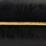 Close-up of the Meridian Plain Velvet Cushion in black, showing the velvet texture with a contrasting gold piped border trim.