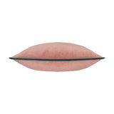 Meridian square cushion in plain blush pink velvet-feel fabric with a contrasting teal piped edge, shown side-on on a plain white background.