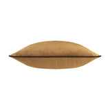 Meridian Plain Velvet Cushion in caramel, shown side-on with a contrasting chocolate-brown piped edge trim, on a plain white background.