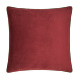 Meridian Plain Velvet Cushion in dark red velvet with a contrasting fir green piped edge trim, shown square on a plain white background.