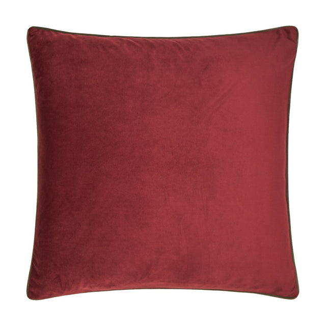 Meridian Plain Velvet Cushion in dark red velvet with a contrasting fir green piped edge trim, shown square on a plain white background.