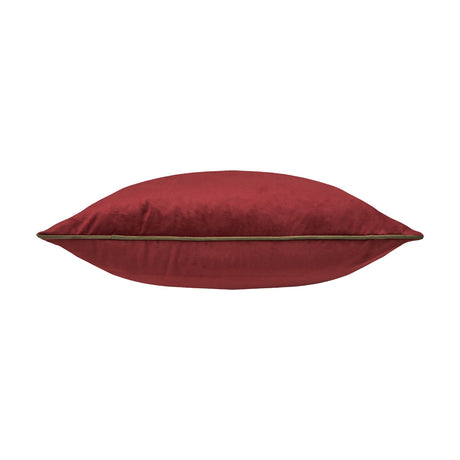 Meridian Plain Velvet Cushion in dark red velvet with a fir green piped trim edging the seam, shown side-on against a plain white background.