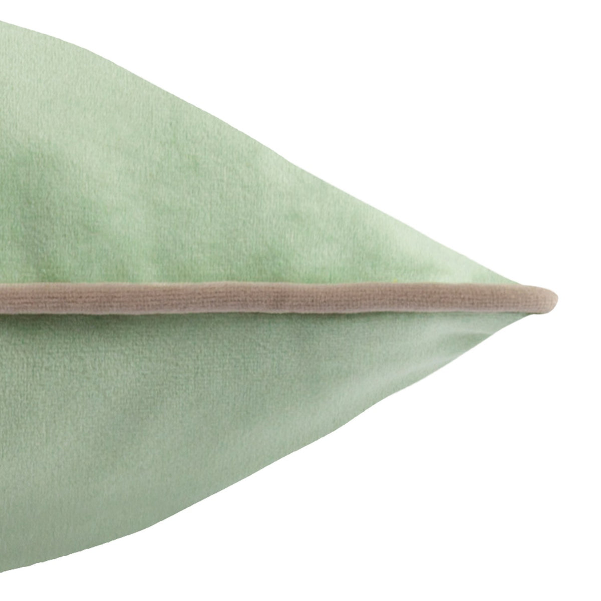 Close-up of the Meridian plain velvet cushion in eucalyptus green with contrasting mocha piped trim along the edge, shown on a plain white background.