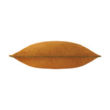 Meridian Plain Velvet Cushion in ginger with olive piped trim, shown side-on to highlight the velvet pile and defined edge seam, on a plain white background.