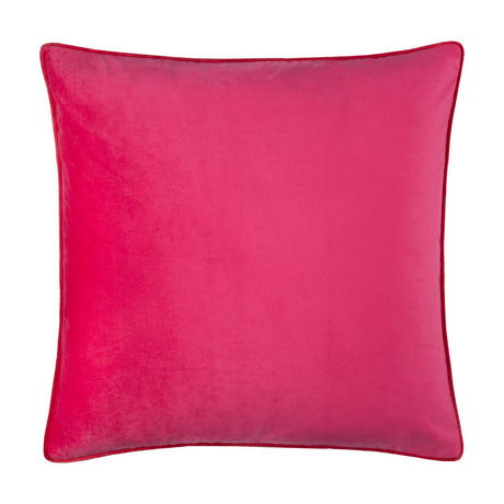 Square Meridian velvet scatter cushion in hot pink with a contrasting red piped edge trim, shown against a plain white background.