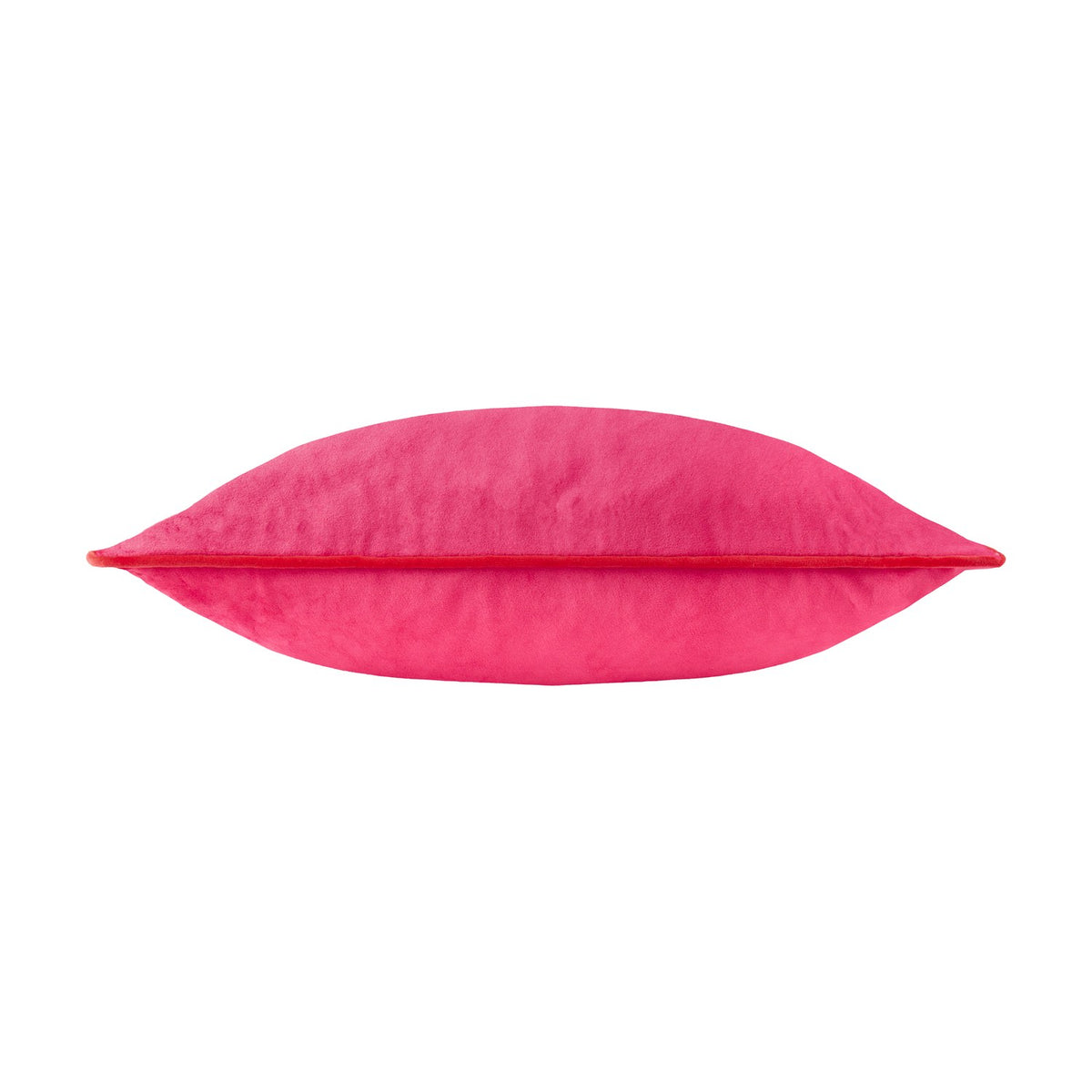 Meridian Plain Velvet Cushion in hot pink with contrasting red piped edging, shown on its side against a plain white background.