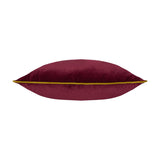Meridian Plain Velvet Cushion in maroon with a contrasting moss green piped edge, shown side-on to display its plump, square velvet form on a plain white background.