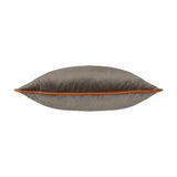 Meridian Plain Velvet Cushion in mocha brown with a contrasting pumpkin orange piped edge, shown side-on to reveal its plump velvet form on a plain white background.