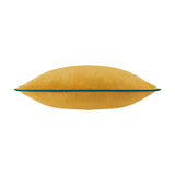 Meridian Plain Velvet Cushion in ochre, shown side-on with soft-touch velvet finish and contrasting teal piped trim along the edge, on a plain white background.