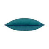 Meridian Plain Velvet Cushion in teal, a plump square cushion with a plain velvet-feel front and navy piped trim edging, shown side-on against a plain white background.