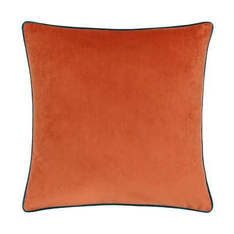 Meridian Plain Velvet Cushion in burnt orange with contrast teal piped edging, square shape, plain background.