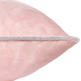 Close-up of the Meridian Plain Velvet Cushion in blush pink velvet-feel fabric with a contrasting light grey piped edge, shown against a plain white background.