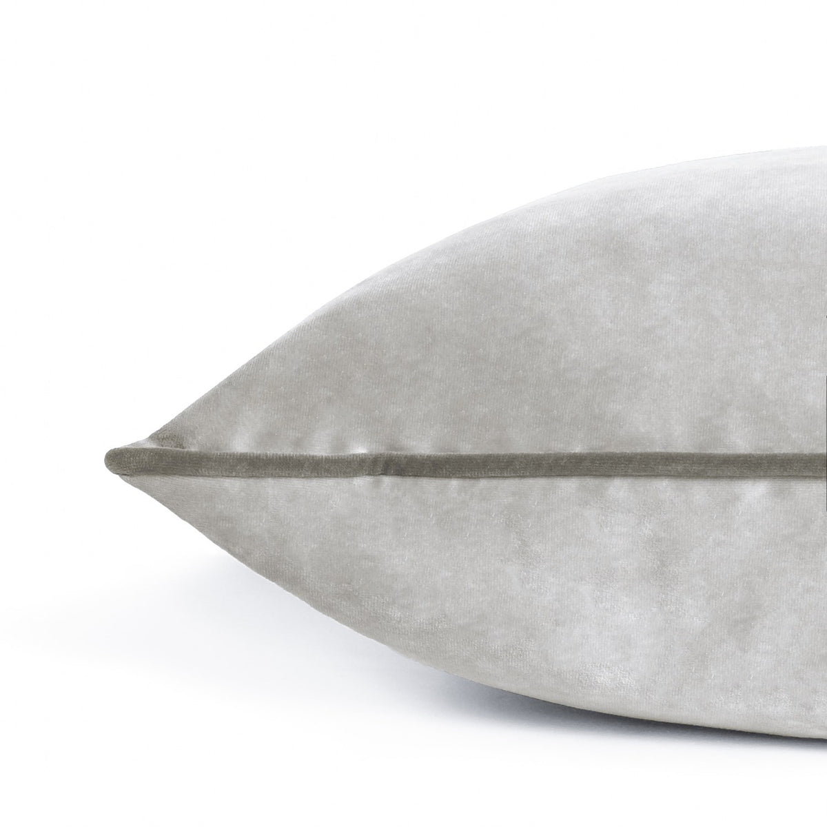 Meridian Plain Velvet Cushion in dove silver with contrasting charcoal piped edge, close-up corner detail on a plain white background.