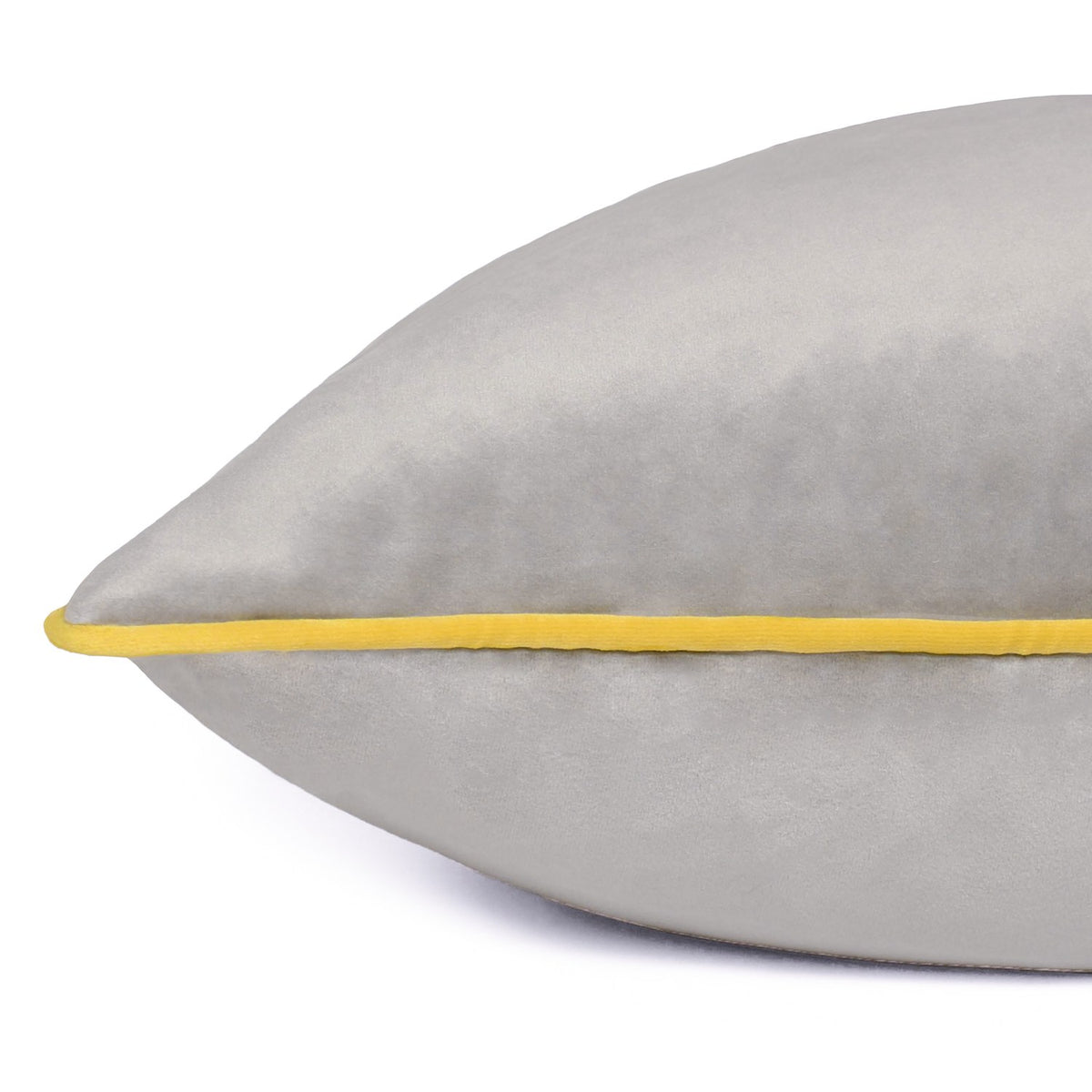 Close-up of the Meridian Plain Velvet Cushion in dove grey, showing the velvet-feel fabric edge with contrasting yellow piping, on a plain white background.