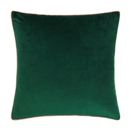 Meridian velvet cushion in emerald green with a blush pink piped edge, square shape, shown on a plain white background.