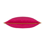 Meridian Plain Velvet Cushion in hot pink with a lime green piped edge, shown side-on on a plain white background.