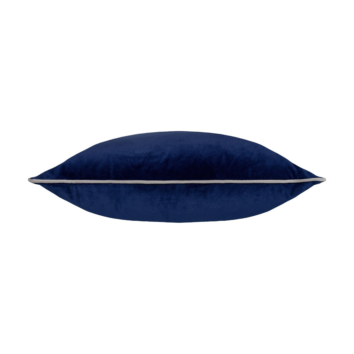 Meridian Plain Velvet Cushion in navy blue, shown side-on to reveal its plump square shape with a silver-grey piped edge, set against a plain white background.