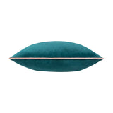 Meridian Plain Velvet Cushion in deep teal with a contrasting blush pink piped edge, shown side-on against a plain white background.
