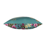 Side view of the Midnight Garden Animal Polyester Cushion in teal, showing its plump edge with a floral border in pink, cream and blue against a plain white background.