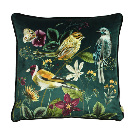 Midnight Garden Animal Velvet Cushion in green, square with piped edge, printed with three garden birds, butterfly and florals on a deep green velvet ground, shown on a white background.