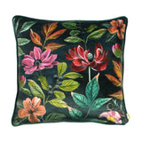 Square Midnight Garden velvet cushion in deep grey with a painterly floral print of pink and crimson blooms, coral flowers, green foliage and dark berries, shown on a plain white background.