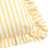 Close-up of the Millie Ruffle Striped Polyester Cushion in yellow and white, showing the heritage stripe fabric and gathered ruffle trim along the edge, on a white background.