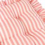 Close-up of the Millie Ruffle Striped Polyester Seat Pad in pink and white, showing buttoned tufts and woven stripe fabric with a gathered ruffle edge.