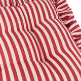 Close-up of the Millie Ruffle Striped Polyester Seat Pad in red and white, showing the tufted padding, vertical stripes, and gathered ruffle edge.