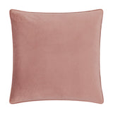 Square velvet cushion in dusty pink with a plain reverse side and matching piped edge trim, shown on a plain white background.