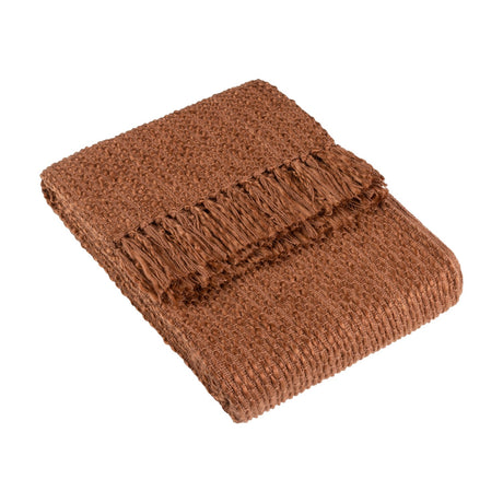 Morni Plain Polycotton Throw in Hazel, folded to show its chunky basketweave texture and tasselled fringe edge, in a rich brown tone against a plain white background.