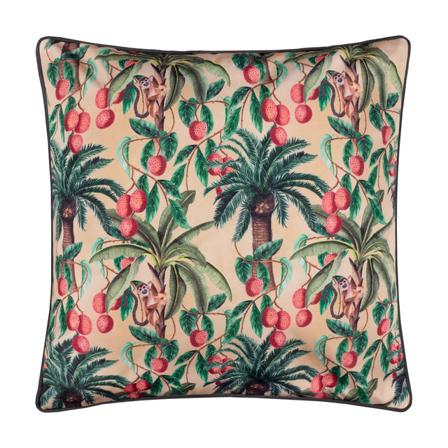 Square polyester cushion in Papyrus beige with a tropical print of palm trees, red lychee fruits and monkeys, finished with black piping, shown on a plain white background.