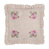 Martha Floral Linen Cushion in pink, square with ruffled edge, oatmeal stripe fabric and corner floral embroidery, shown on a plain white background.
