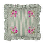 Martha Floral Linen Cushion in Sage, a 50cm square cushion with green-and-cream ticking stripes, corner floral embroidery in pink and lilac, and a gathered ruffle edge, shown on a white background.
