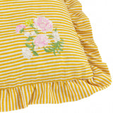 Martha Floral Linen Cushion in yellow-and-cream stripe with pink and cream floral embroidery and green foliage detail, ruffled edge trim, shown close-up on a white background.