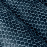Close-up of Neptune Velvet Eyelet Curtains in navy, showing the cut-velvet pile's raised honeycomb pattern catching light across the fabric.