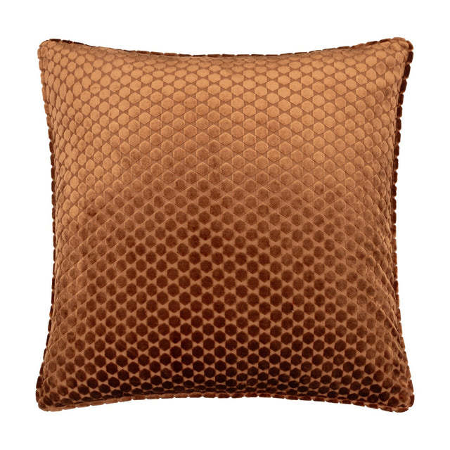 Neptune Geometric Velvet Cushion in copper orange, square with a raised honeycomb pattern shifting between caramel and chocolate tones, shown on a plain white background.