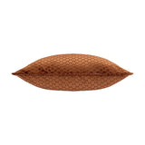 Neptune Geometric Velvet Cushion in copper orange, shown side-on with a visible centre seam and honeycomb-textured velvet pile, set against a plain white background.