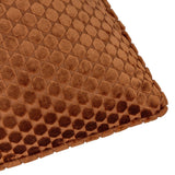 Close-up of the Neptune Geometric Velvet Cushion in copper, showing a raised honeycomb velvet pattern with piped edging on a plain white background.
