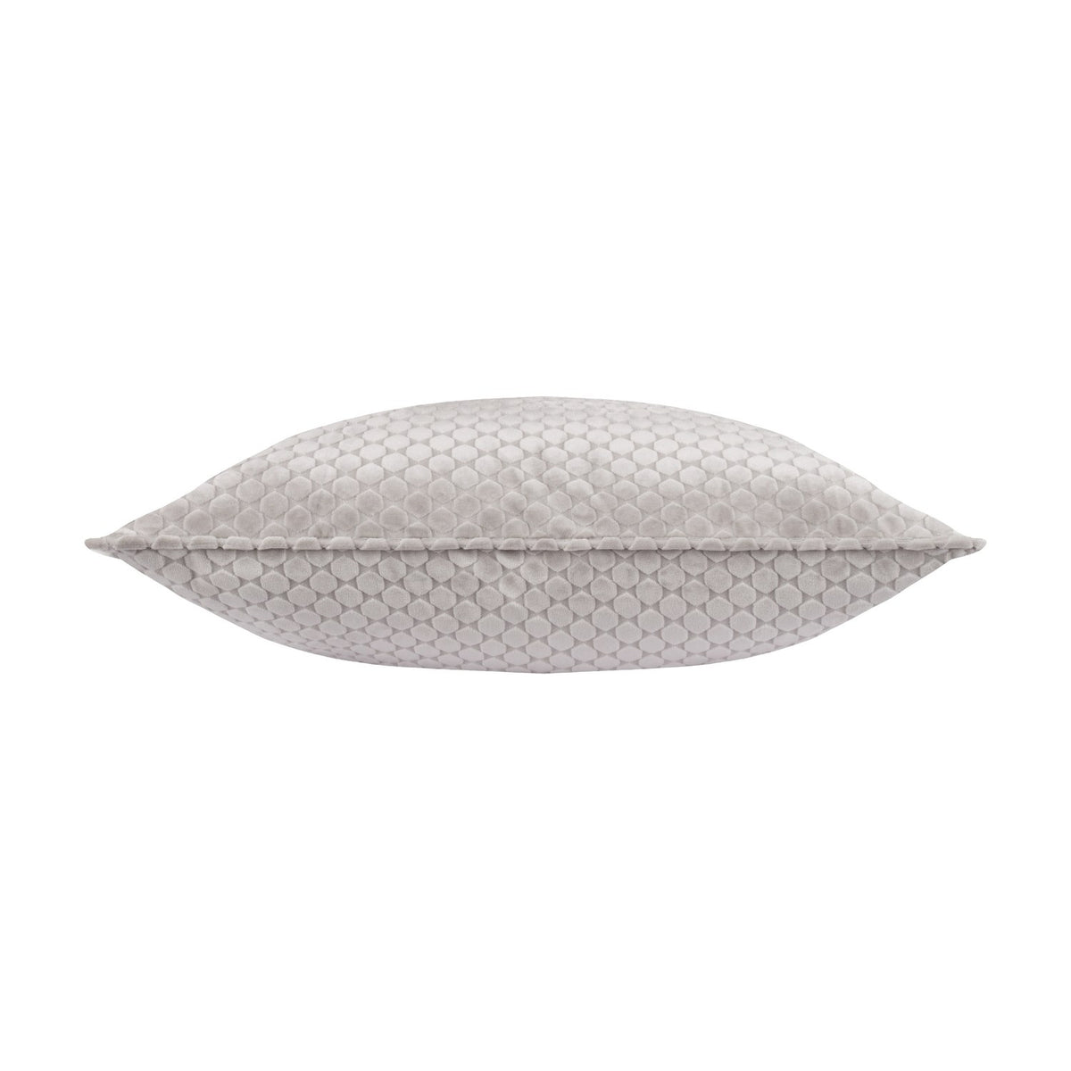 Neptune Geometric Velvet Cushion in silver grey, shown side-on to reveal a plump square shape with piped edges and a raised honeycomb dot pattern, set against a plain white background.