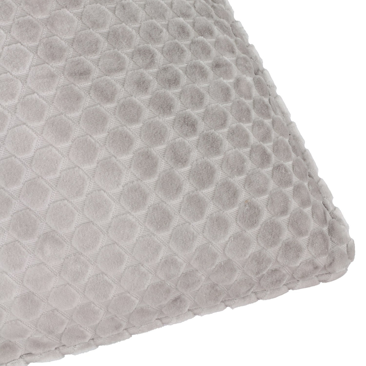 Close-up of the Neptune Geometric Velvet Cushion in silver grey, showing raised honeycomb dots within a diamond grid pattern and a stitched edge seam.