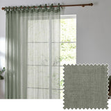 Sheer eucalyptus green tie-top curtain panel hung on a wooden pole beside a bright window, with a fabric swatch showing the woven polyester texture.
