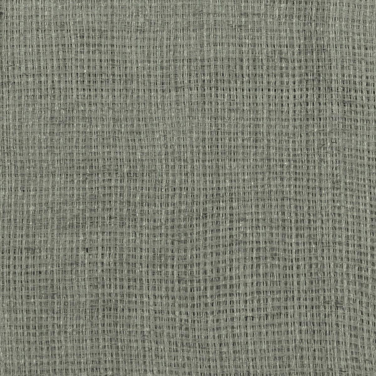 Close-up of the Nimbus sheer curtain panel showing its open, loosely woven eucalyptus green polyester fabric texture.