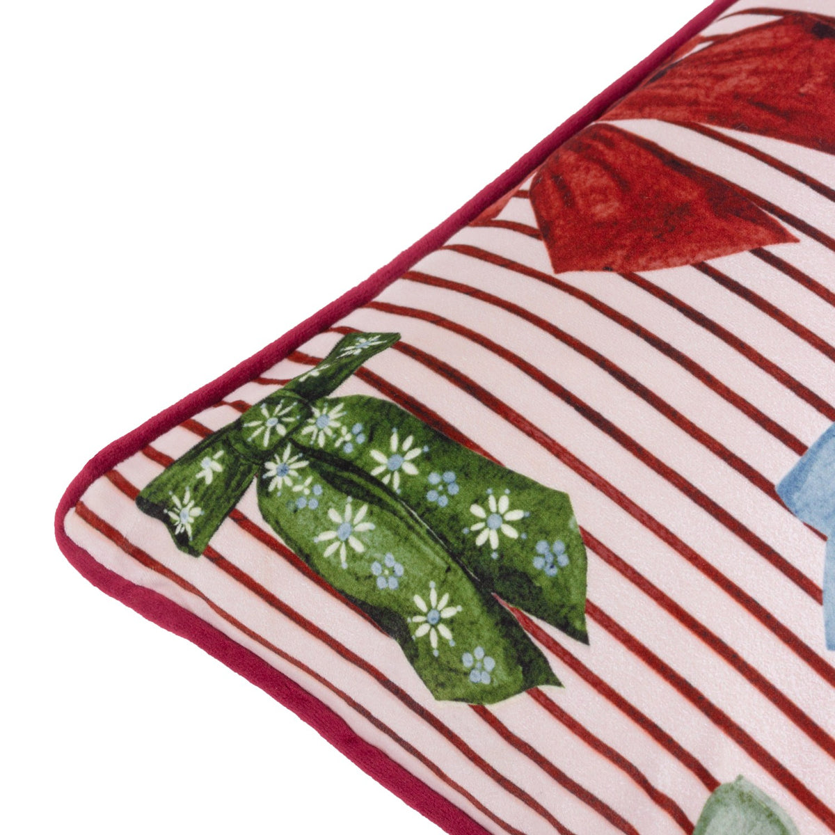 Close-up of the Noortje Velvet Silk Cushion in Silk Pink, showing a pink striped velvet face with a printed green pea pod and daisy motif, finished with a dark pink piped edge.